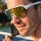 Male pickleball player wearing FortyFour Aura Sunglasses on the court