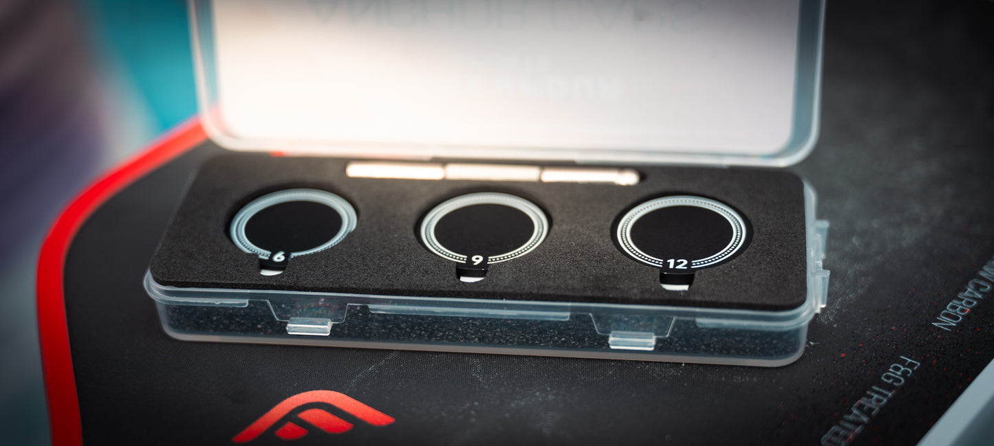 Anchor Caps case open showing 6, 9 and 12 gram coins and install tool