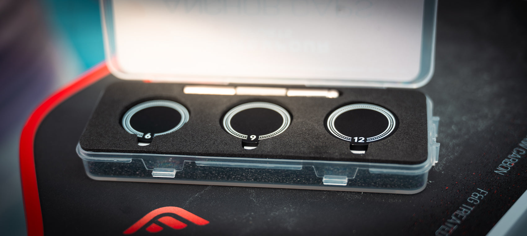 Anchor Caps case open showing 6, 9 and 12 gram coins and install tool