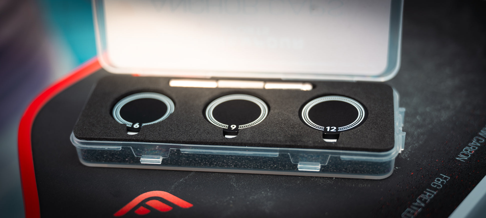 Anchor Caps case open showing 6, 9 and 12 gram coins and install tool
