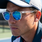 Male player wearing FortyFour Shades courtside